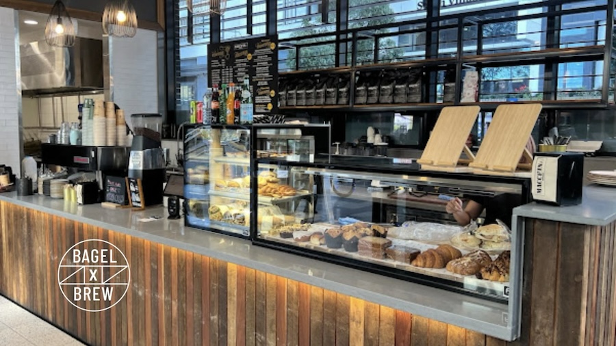Best bagels in Kirrawee display counter at Bagel X Brew cafe with fresh bagels and Campos coffee bar